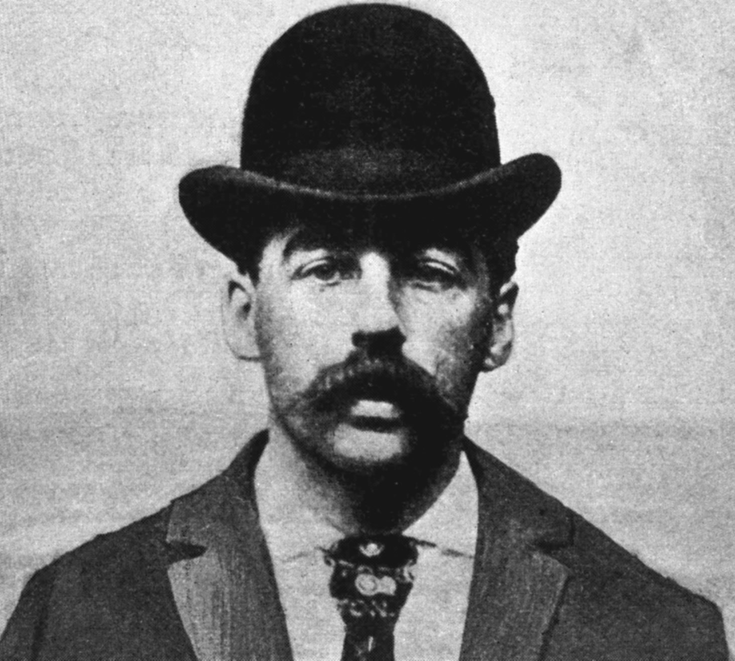 The Real Story Of H. H. Holmes, The Con Man Who Killed For Insurance Money